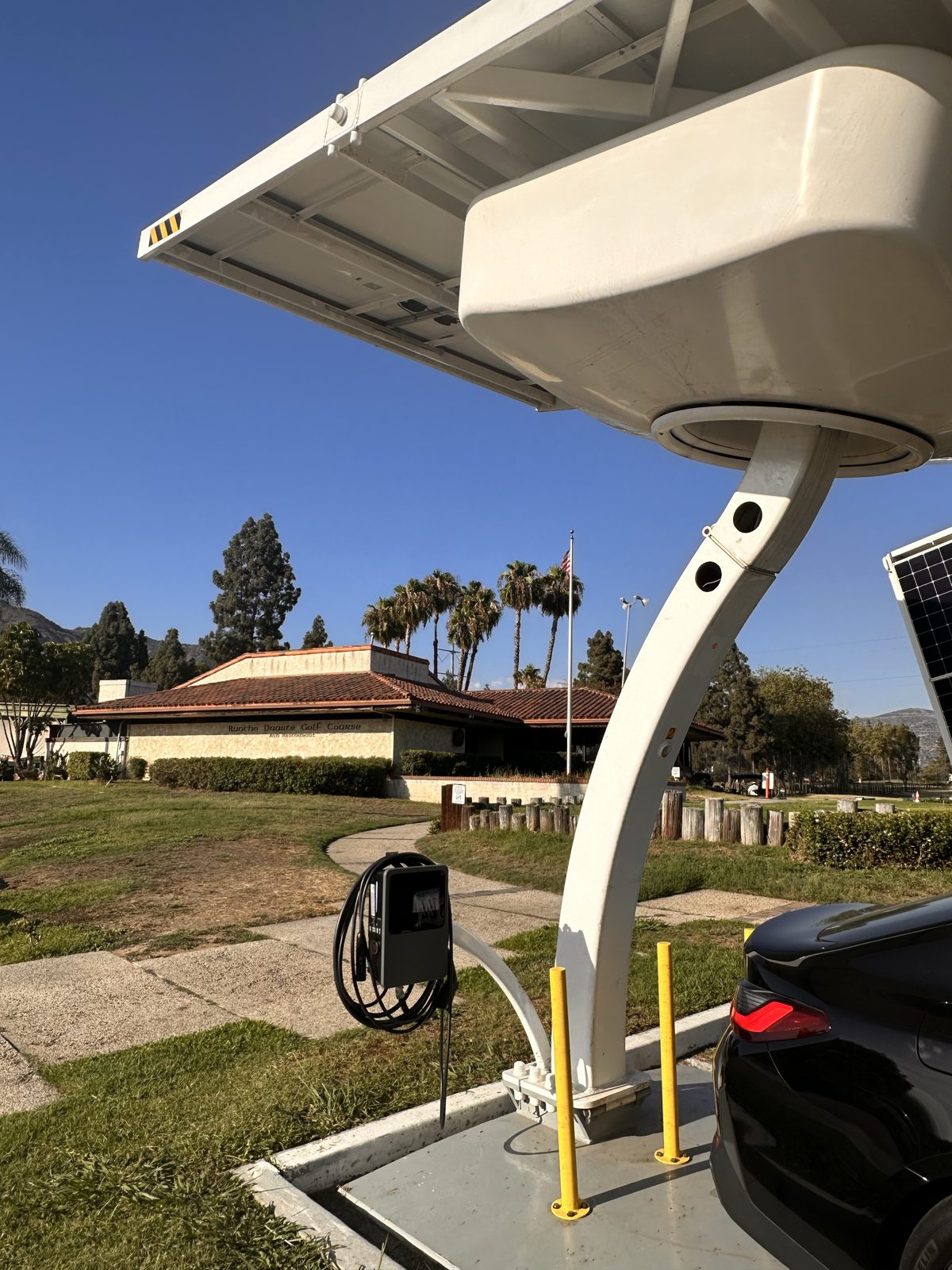 Solar canopy charging station at a golf course